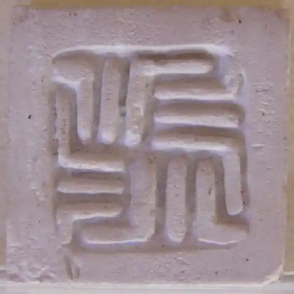Hermatite and faience seals, multiline swastika